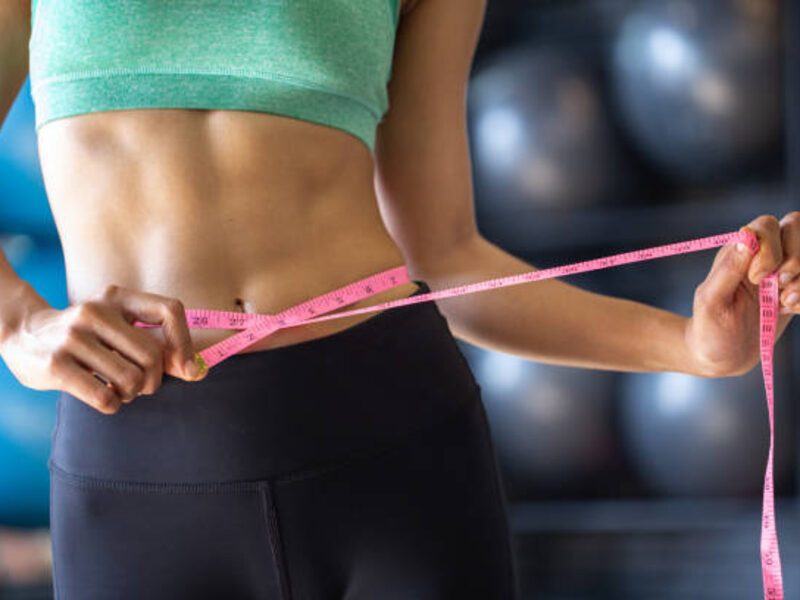 Measuring tape representing weight management